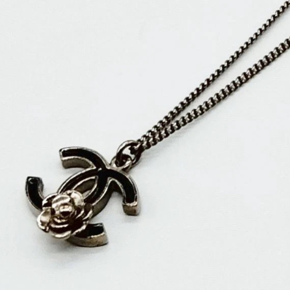 CHANEL Black and Silver Camellia Necklace